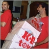 Our crew members bringing the donations inside
