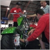 Our mover helping set up a motorcycle on a display platform