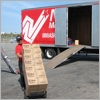 Unloading the first of many boxes
