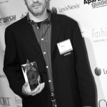 NorthStar Moving Corporation's Owner and Co-Founder Ram Katalan holding the award.